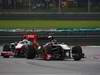 GP MALESIA, 10.04.2011- Gara, Nick Heidfeld (GER) Lotus Renault GP R31  davanti a Lewis Hamilton (GBR), McLaren  Mercedes, MP4-26 