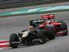 GP MALESIA, 10.04.2011- Gara, Jarno Trulli (ITA), Team Lotus, TL11 e Timo Glock (GER), Marussia Virgin Racing VR-02 
