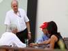 GP SINGAPORE, 24.09.2011- Bernie Ecclestone (GBR), President e CEO of Formula One Management with Domenica Fabiana Flosi (BRA) e Nikki Lauda (AU) 