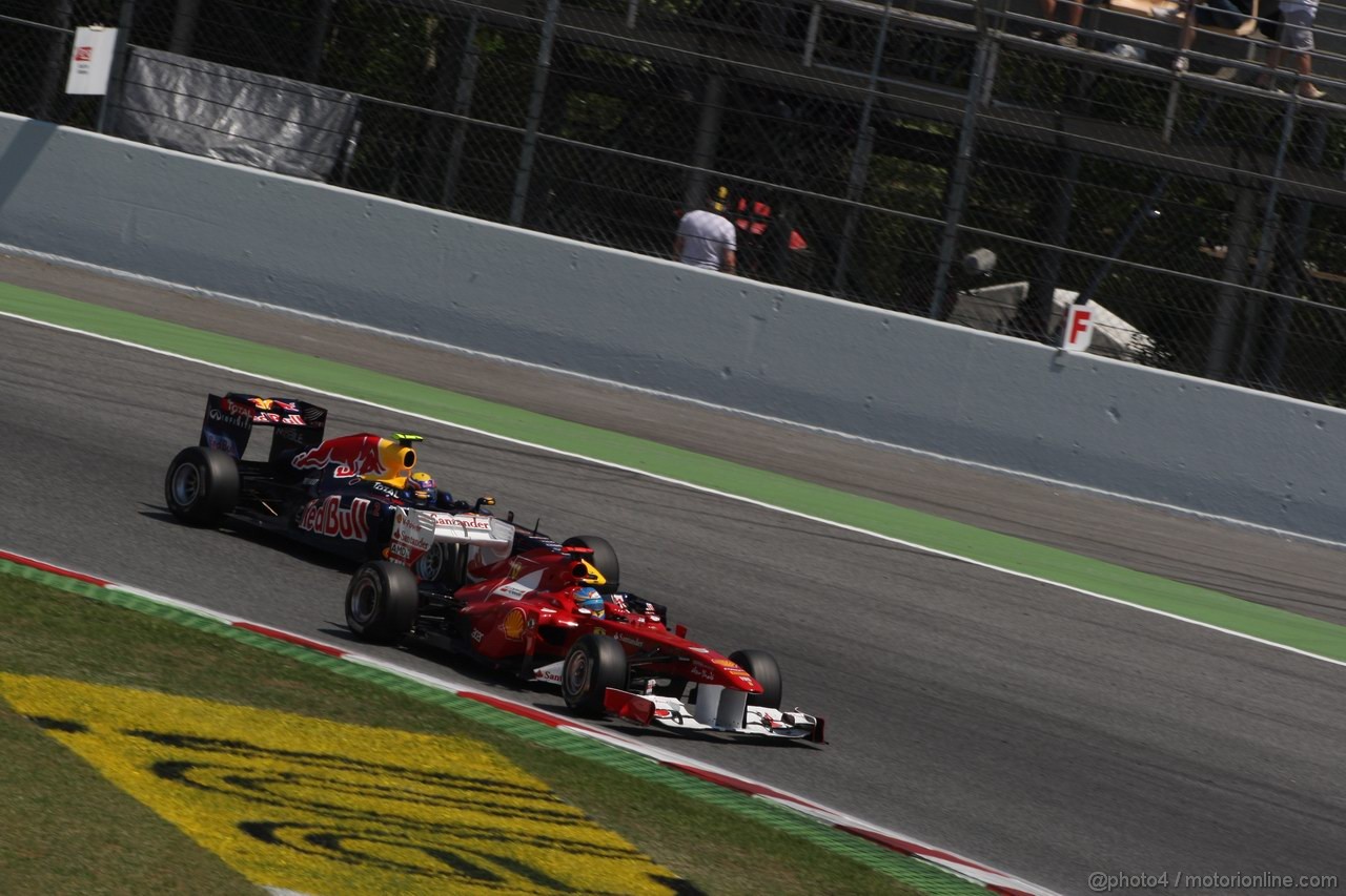 GP SPAGNA, 22.05.2011- Gara, Mark Webber (AUS), Red Bull Racing, RB7 e Fernando Alonso (ESP), Ferrari, F-150 Italia 