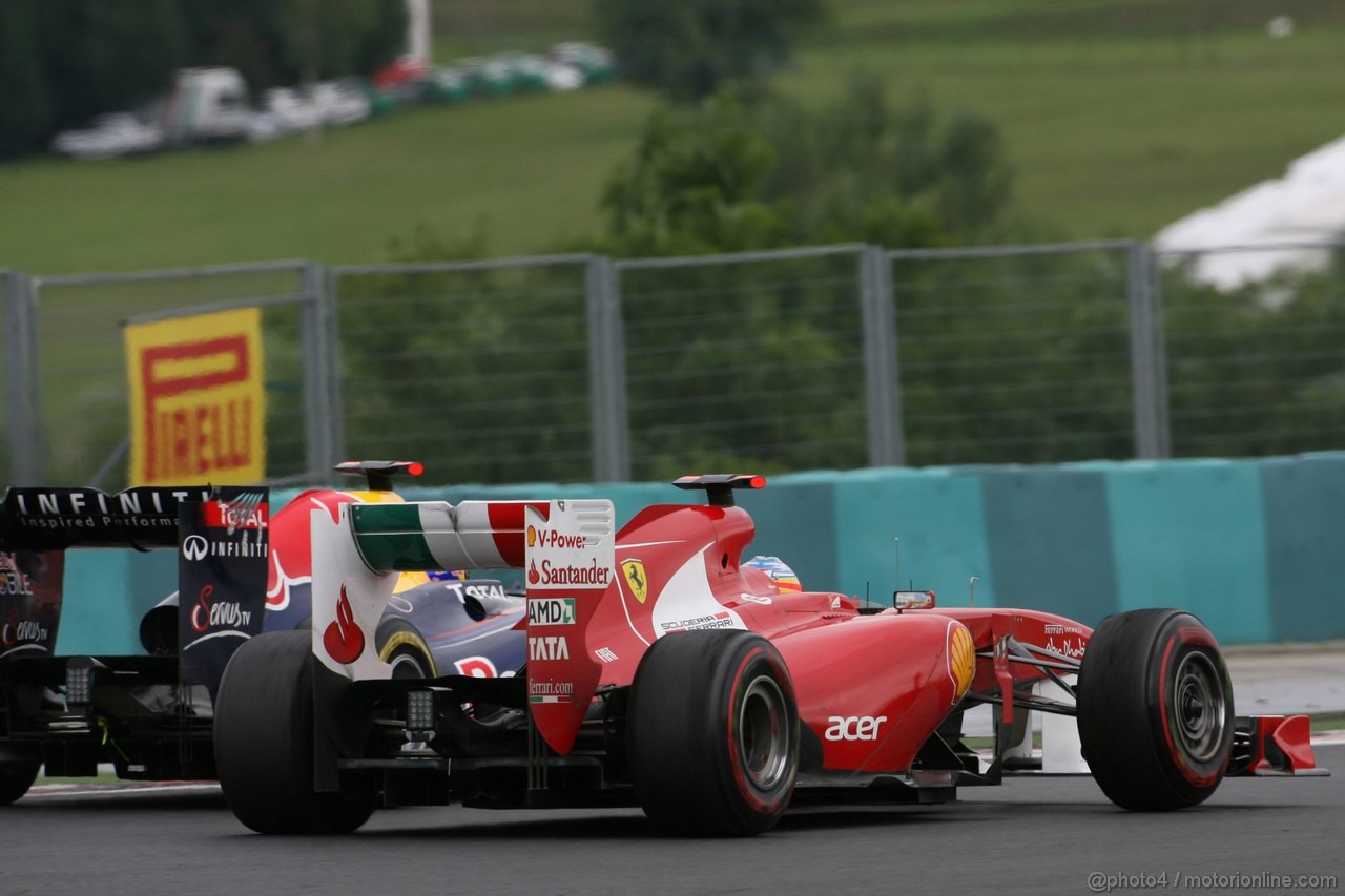 GP UNGHERIA, 31.07.2011 Fernando Alonso (ESP), Ferrari, F-150 Italia e Sebastian Vettel (GER), Red Bull Racing, RB7