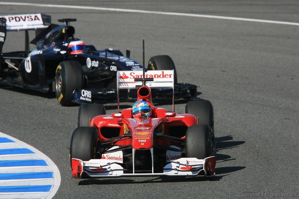 Jerez Test Febbraio 2011, 12.02.2011- Fernando Alonso (ESP), Ferrari, F-150 Italia e Rubens Barrichello (BRA), Williams FW33 