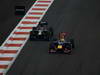 GP ABU DHABI, Gara: Sebastian Vettel (GER) Red Bull Racing RB8 overtakes Heikki Kovalainen (FIN) Caterham F1 Team CT01