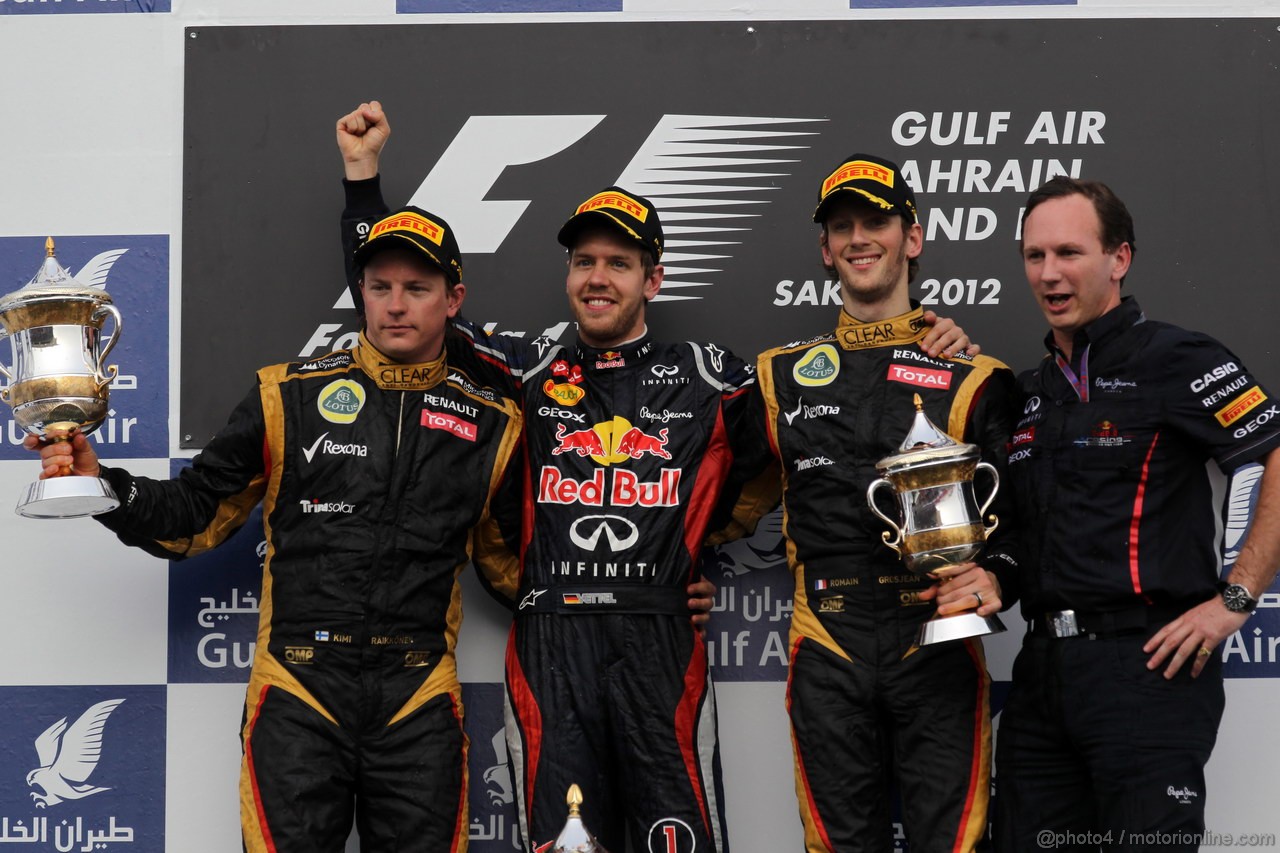 GP BAHRAIN, 22.04.2012- Gara, Sebastian Vettel (GER) Red Bull Racing RB8 vincitore, Kimi Raikkonen (FIN) Lotus F1 Team E20 secondo e Romain Grosjean (FRA) Lotus F1 Team E20 terzo with Christian Horner (GBR), Red Bull Racing, Sporting Director 
