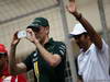 GP BAHRAIN, 22.04.2012- Vitaly Petrov (RUS) Caterham F1 Team CT01 e Narain Karthikeyan (IND) HRT Formula 1 Team F112 at drivers parade  