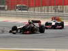 GP BAHRAIN, 22.04.2012- Gara,Romain Grosjean (FRA) Lotus F1 Team E20 davanti a Lewis Hamilton (GBR) McLaren Mercedes MP4-27 