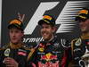 GP BAHRAIN, 22.04.2012- Gara, Sebastian Vettel (GER) Red Bull Racing RB8 vincitore, Kimi Raikkonen (FIN) Lotus F1 Team E20 secondo e Romain Grosjean (FRA) Lotus F1 Team E20 terzo 