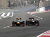 GP BAHRAIN, 22.04.2012- Gara, Sebastian Vettel (GER) Red Bull Racing RB8 andKimi Raikkonen (FIN) Lotus F1 Team E20 
