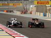 GP BAHRAIN, 22.04.2012- Gara, Kamui Kobayashi (JAP) Sauber F1 Team C31 e Romain Grosjean (FRA) Lotus F1 Team E20 