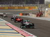 GP BAHRAIN, 22.04.2012- Gara, Michael Schumacher (GER) Mercedes AMG F1 W03 davanti a Charles Pic (FRA) Marussia F1 Team MR01 