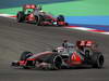 GP BAHRAIN, 22.04.2012- Gara, Jenson Button (GBR) McLaren Mercedes MP4-27 davanti a Lewis Hamilton (GBR) McLaren Mercedes MP4-27 