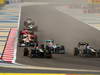 GP BAHRAIN, 22.04.2012- Gara, Heikki Kovalainen (FIN) Caterham F1 Team CT01, Michael Schumacher (GER) Mercedes AMG F1 W03 e Vitaly Petrov (RUS) Caterham F1 Team CT01 
