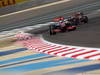GP BAHRAIN, 21.04.2012.- Qualifiche, Jenson Button (GBR) McLaren Mercedes MP4-27 e Sebastian Vettel (GER) Red Bull Racing RB8 