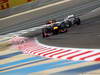 GP BAHRAIN, 21.04.2012.- Qualifiche, Mark Webber (AUS) Red Bull Racing RB8 e Sergio Prez (MEX) Sauber F1 Team C31 
