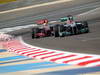GP BAHRAIN, 21.04.2012.- Qualifiche, Lewis Hamilton (GBR) McLaren Mercedes MP4-27 andMichael Schumacher (GER) Mercedes AMG F1 W03 