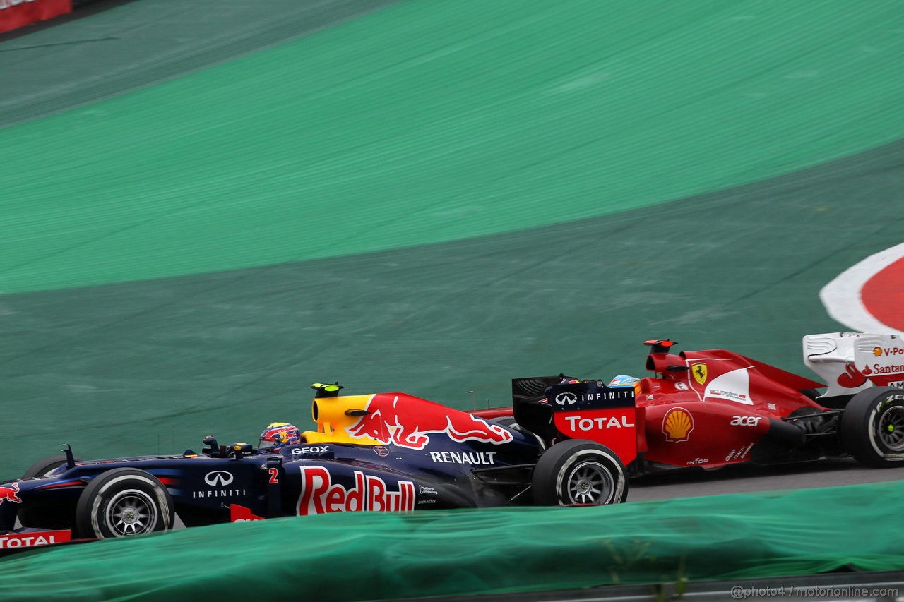GP BRASILE, 25.11.2012- Gara, Mark Webber (AUS) Red Bull Racing RB8 e Fernando Alonso (ESP) Ferrari F2012 