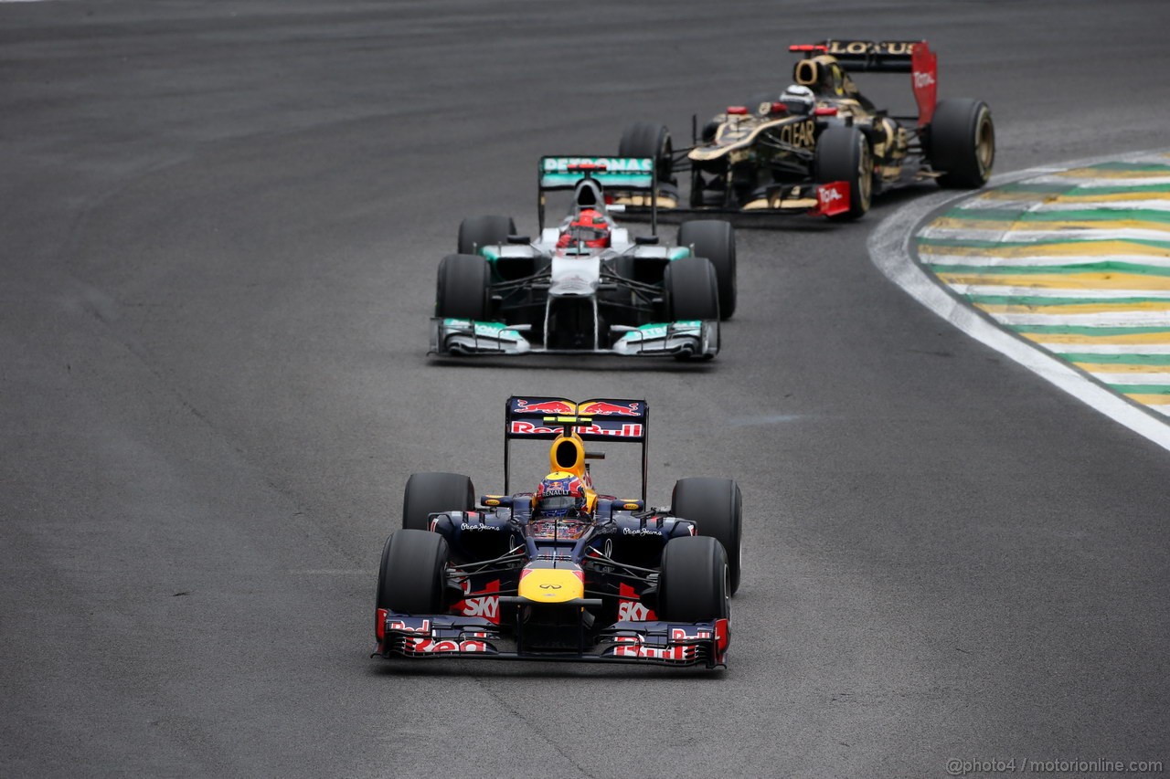 GP BRASILE, 25.11.2012- Gara, Mark Webber (AUS) Red Bull Racing RB8 davanti a Michael Schumacher (GER) Mercedes AMG F1 W03 