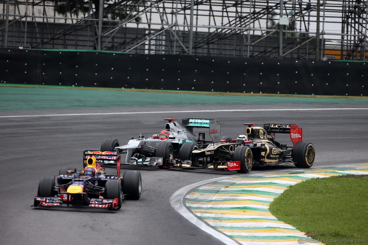 GP BRASILE, 25.11.2012- Gara, Michael Schumacher (GER) Mercedes AMG F1 W03 e Kimi Raikkonen (FIN) Lotus F1 Team E20