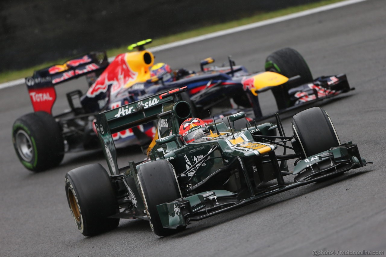 GP BRASILE, 25.11.2012- Gara, Heikki Kovalainen (FIN) Caterham F1 Team CT01 e Mark Webber (AUS) Red Bull Racing RB8 