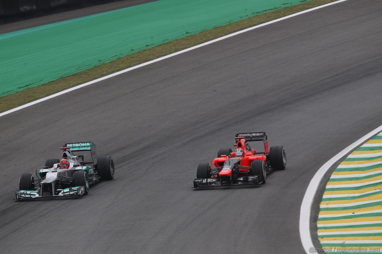 GP BRASILE, 25.11.2012- Gara,Michael Schumacher (GER) Mercedes AMG F1 W03 e Timo Glock (GER) Marussia F1 Team MR01 
