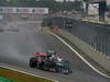 GP BRASILE, 25.11.2012- Gara, Daniel Ricciardo (AUS) Scuderia Toro Rosso STR7 e Michael Schumacher (GER) Mercedes AMG F1 W03 
