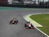 GP BRASILE, 25.11.2012- Gara, Sebastian Vettel (GER) Red Bull Racing RB8 e Narain Karthikeyan (IND) HRT Formula 1 Team F112 
