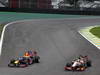 GP BRASILE, 25.11.2012- Gara, Sebastian Vettel (GER) Red Bull Racing RB8 e Narain Karthikeyan (IND) HRT Formula 1 Team F112 