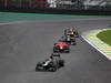 GP BRASILE, 25.11.2012- Gara, Heikki Kovalainen (FIN) Caterham F1 Team CT01 davanti a Timo Glock (GER) Marussia F1 Team MR01 