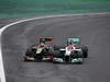 GP BRASILE, 25.11.2012- Gara, Kimi Raikkonen (FIN) Lotus F1 Team E20 e Michael Schumacher (GER) Mercedes AMG F1 W03