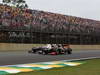GP BRASILE, 25.11.2012- Gara, Kamui Kobayashi (JAP) Sauber F1 Team C31 e Kimi Raikkonen (FIN) Lotus F1 Team E20 