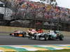 GP BRASILE, 25.11.2012- Gara, Narain Karthikeyan (IND) HRT Formula 1 Team F112 e Nico Rosberg (GER) Mercedes AMG F1 W03 