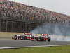GP BRASILE, 25.11.2012- Gara, Jenson Button (GBR) McLaren Mercedes MP4-27 e Lewis Hamilton (GBR) McLaren Mercedes MP4-27