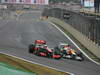 GP BRASILE, 25.11.2012- Gara, Jenson Button (GBR) McLaren Mercedes MP4-27 e Nico Hulkenberg (GER) Sahara Force India F1 Team VJM05