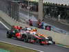 GP BRASILE, 25.11.2012- Gara, Jenson Button (GBR) McLaren Mercedes MP4-27 e Nico Hulkenberg (GER) Sahara Force India F1 Team VJM05 