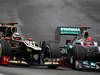 GP BRASILE, 25.11.2012- Gara, Kimi Raikkonen (FIN) Lotus F1 Team E20 e Michael Schumacher (GER) Mercedes AMG F1 W03 