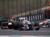 GP BRASILE, 25.11.2012- Gara, Kamui Kobayashi (JAP) Sauber F1 Team C31 davanti aSebastian Vettel (GER) Red Bull Racing RB8 