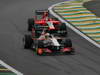 GP BRASILE, 24.11.2012- Qualifiche, Narain Karthikeyan (IND) HRT Formula 1 Team F112 e Timo Glock (GER) Marussia F1 Team MR01 