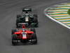 GP BRASILE, 24.11.2012- Qualifiche, Timo Glock (GER) Marussia F1 Team MR01 davanti a Vitaly Petrov (RUS) Caterham F1 Team CT01 