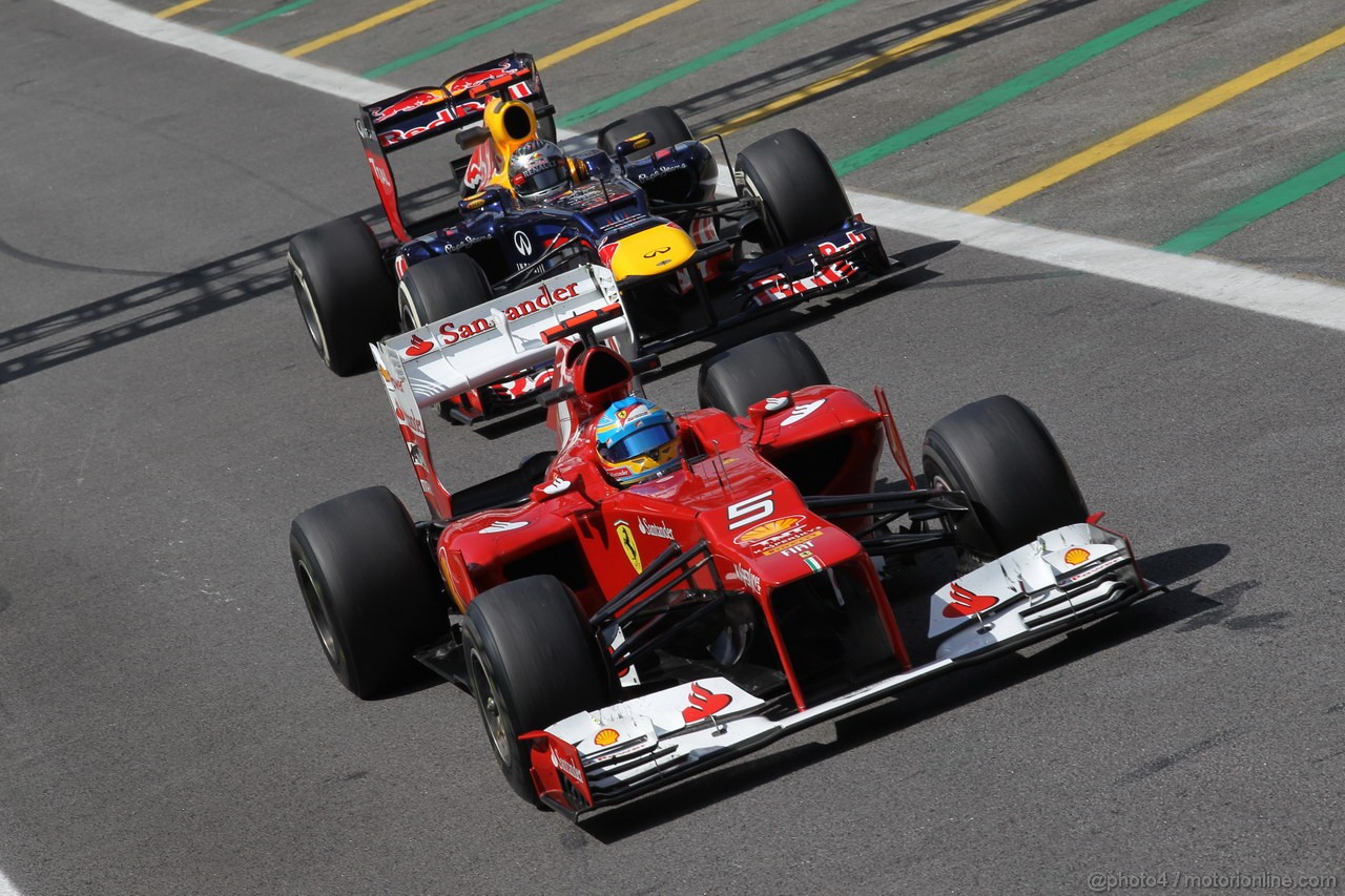 GP BRASILE, 23.11.2012- Prove Libere 2, Fernando Alonso (ESP) Ferrari F2012 e Sebastian Vettel (GER) Red Bull Racing RB8 