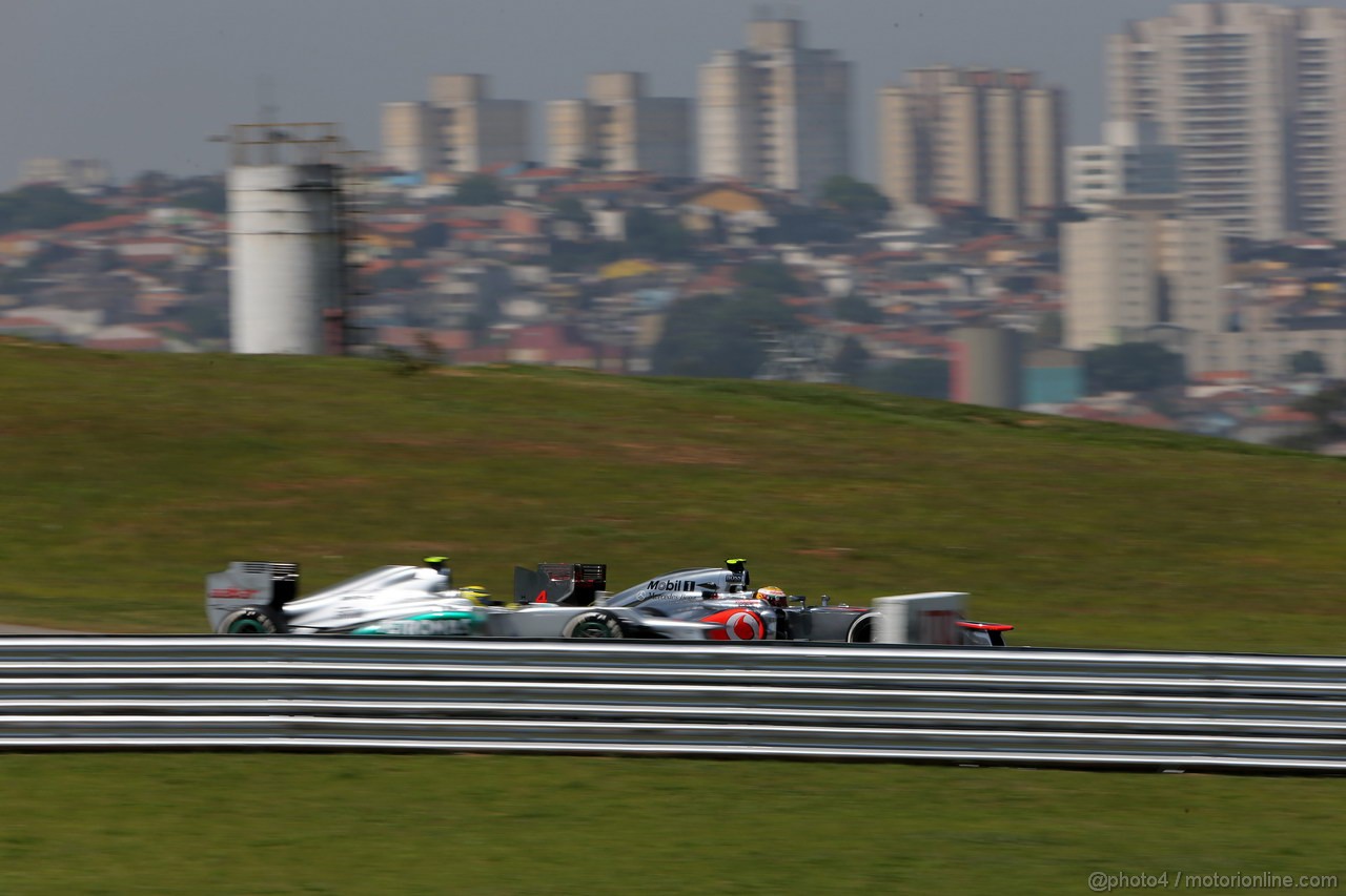 GP BRASILE, 23.11.2012- Prove Libere 2, Nico Rosberg (GER) Mercedes AMG F1 W03 e Lewis Hamilton (GBR) McLaren Mercedes MP4-27 