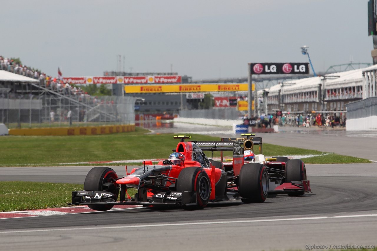 GP CANADA, 10.06.2012- Gara, Charles Pic (FRA) Marussia F1 Team MR01 davanti a Narain Karthikeyan (IND) HRT Formula 1 Team F112  