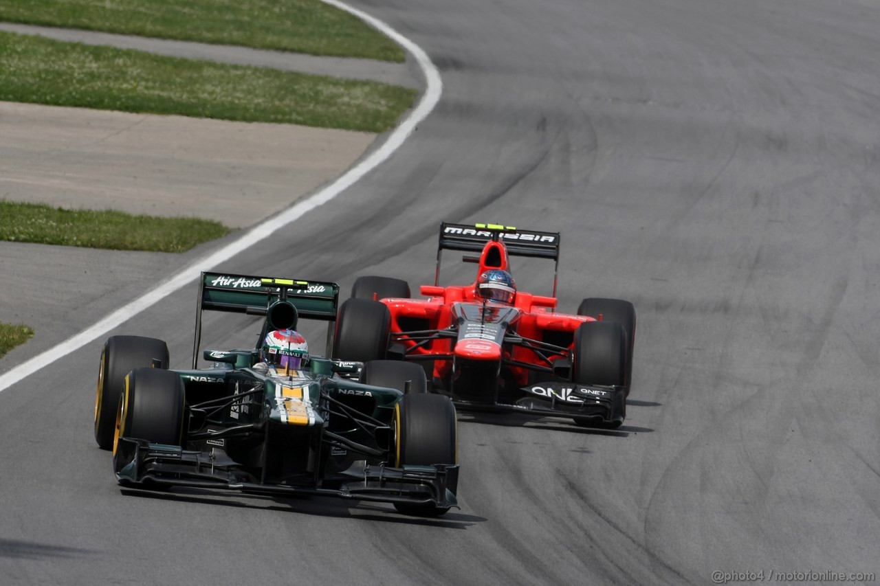 GP CANADA, 10.06.2012- Gara, Vitaly Petrov (RUS) Caterham F1 Team CT01 e Charles Pic (FRA) Marussia F1 Team MR01 