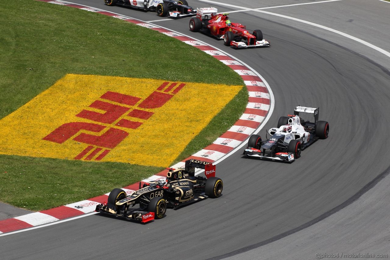 GP CANADA, 10.06.2012- Gara, Kimi Raikkonen (FIN) Lotus F1 Team E20 e Kamui Kobayashi (JAP) Sauber F1 Team C31 