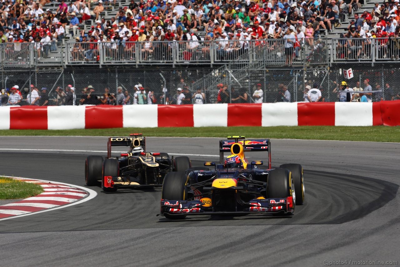 GP CANADA, 10.06.2012- Gara, Mark Webber (AUS) Red Bull Racing RB8 e Kimi Raikkonen (FIN) Lotus F1 Team E20 