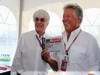 GP CANADA, 10.06.2012- Bernie Ecclestone (GBR), President e CEO of Formula One Management e Mario Andretti (USA) (Centre) presenting a VIP ticket for the 2012 United States Grand Prix