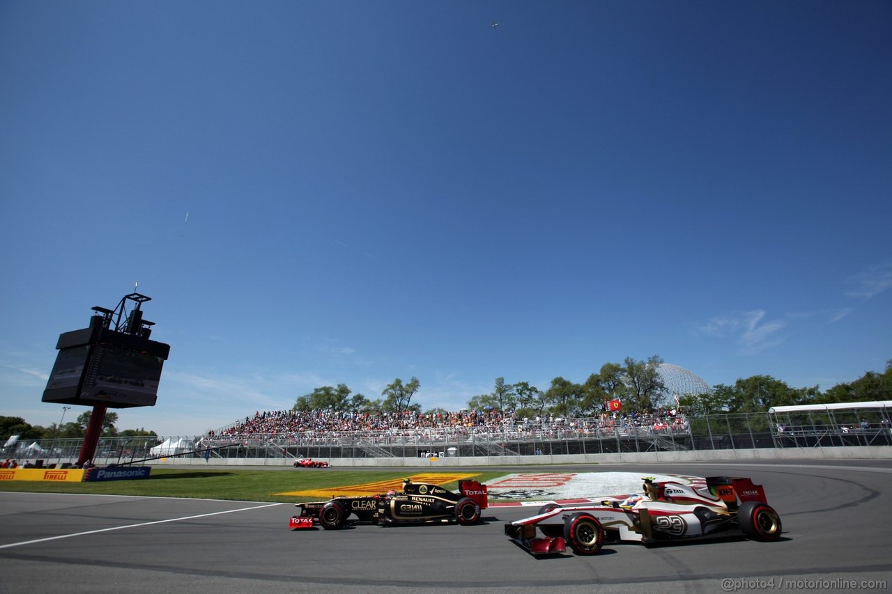 GP CANADA, 09.06.2012- Prove Libere 3, Romain Grosjean (FRA) Lotus F1 Team E20 e Narain Karthikeyan (IND) HRT Formula 1 Team F112 
