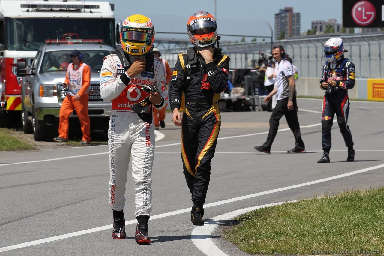 GP CANADA, 09.06.2012- Qualifiche, Lewis Hamilton (GBR) McLaren Mercedes MP4-27 e Romain Grosjean (FRA) Lotus F1 Team E20 