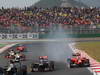 GP COREA, 14.10.2012- Gara, Daniel Ricciardo (AUS) Scuderia Toro Rosso STR7 e Timo Glock (GER) Marussia F1 Team MR01 