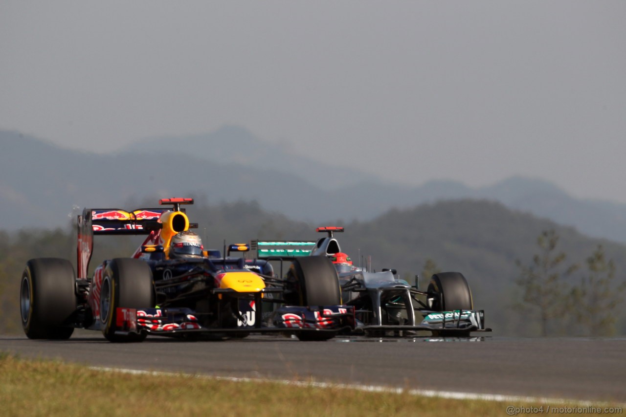 GP COREA, 12.10.2012-  Prove Libere 2, Sebastian Vettel (GER) Red Bull Racing RB8 e Michael Schumacher (GER) Mercedes AMG F1 W03 