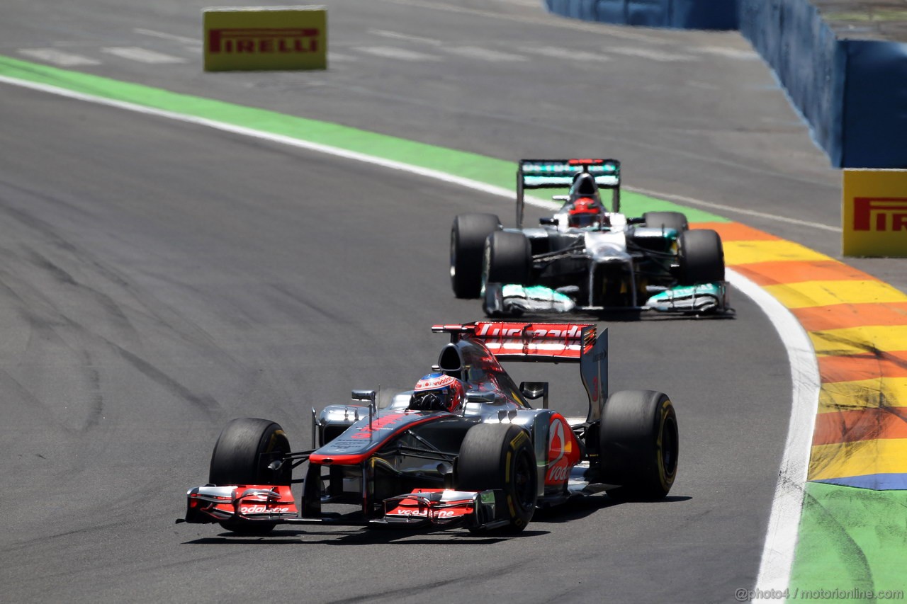 GP EUROPA, 24.06.2012- Gara, Jenson Button (GBR) McLaren Mercedes MP4-27 davanti a Michael Schumacher (GER) Mercedes AMG F1 W03 